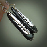 Hand carved New Zealand Jade drop Earrings by Amanda Thompson. Made by NZ Pacific and for sale online. Jade, Hand made Jewellery made in New Zealand. Free delivery worldwide. One pair only, delivered in a kete pouch.